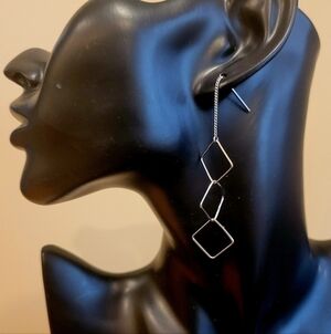 Silvertone drop earring